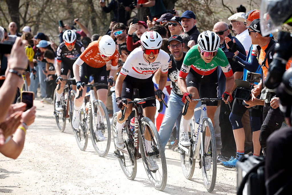 SIENA, ITALY - MARCH 07: (L-R) Kasia Niewiadoma of Poland and Team CANYON//SRAM zondacrypto and Elisa Longo Borghini of Italy and UAE Team ADQ compete in the chase group during to the 12th Strade Bianche Donne 2026 a 133km one day race from Siena to Siena / #UCIWWT / on March 07, 2026 in Siena, Italy. (Photo by Massimo Fulgenzi - Pool/Getty Images)
