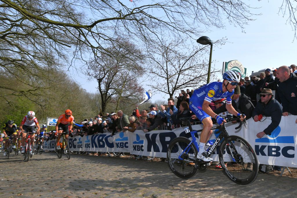 WEVELGEM BELGIUM MARCH 31 Zdenek Stybar of Czech Republic and Team DeceuninckQuickStep Tiesj Benoot of Belgium and Team Lotto Soudal Greg Van Avermaet of Belgium and CCC Team Kemmelberg Ossuaire Cobblestones Fans Public during the 81st GentWevelgem In Flanders Fields 2019 a 2515km race from Deinze to Wevelgem Flandersclassics on March 31 2019 in Wevelgem Belgium Photo by Tim de WaeleGetty Images