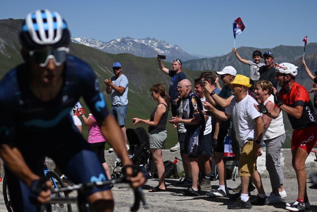 Supporters cheer the riders at Col de la Croix de Fer during the seventh stage of the 74th edition of the Criterium du Dauphine cycling race 135kms between SaintChaffrey to Vaujany southeastern France on June 11 2022 Photo by Marco BERTORELLO AFP Photo by MARCO BERTORELLOAFP via Getty Images