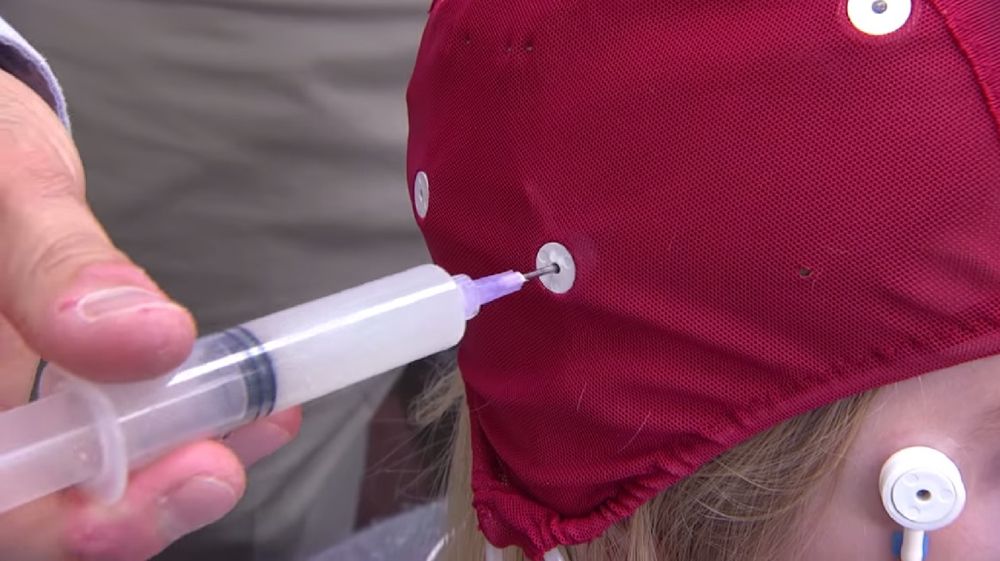 syringe in thinking cap