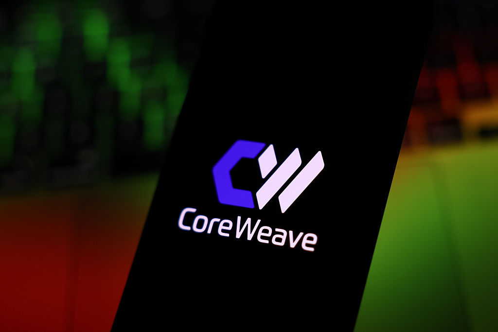 CoreWeave logo displayed on a phone screen