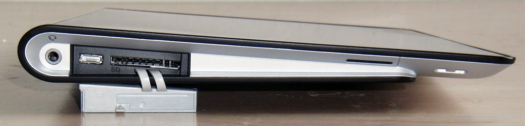 Left Side: Headphone, microUSB, SD card, Speaker