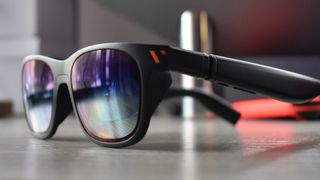 Photo of VITURE Pro XR Glasses on a desk.