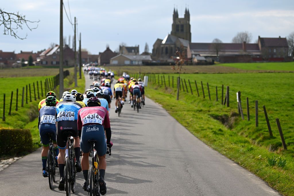BREDENE BELGIUM MARCH 17 A general view of Declan Irvine of Australia and Team Novo Nordisk Daan Van Sintmaartensdijk of The Netherlands and VolkerWessels Cycling Team Nicolas Dalla Valle of Italy and Team Corratec and the peloton compete during the 21th Bredene Koksijde Classic 2023 a 1916km one day race from Bredene to Koksijde on March 17 2023 in Koksijde Belgium Photo by Luc ClaessenGetty Images