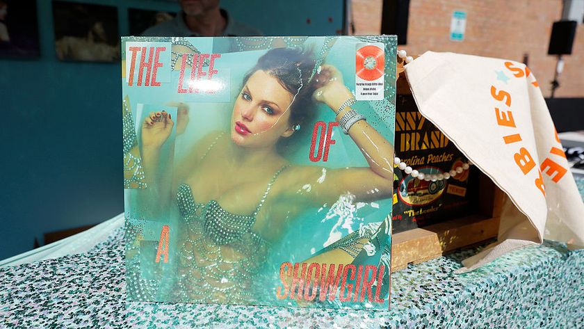 The Life of a Showgirl Taylor Swift album next to orange merch