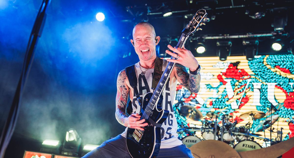 Matt Heafy of Trivium is feeling the power of the riff onstage as he performs with his signature Epiphone Les Paul Custom in Ebony.