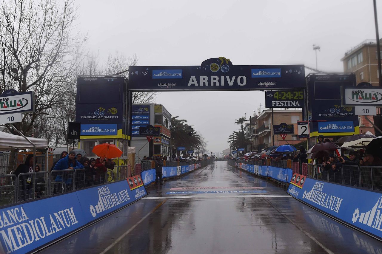 The wet finish line awaits the peloton