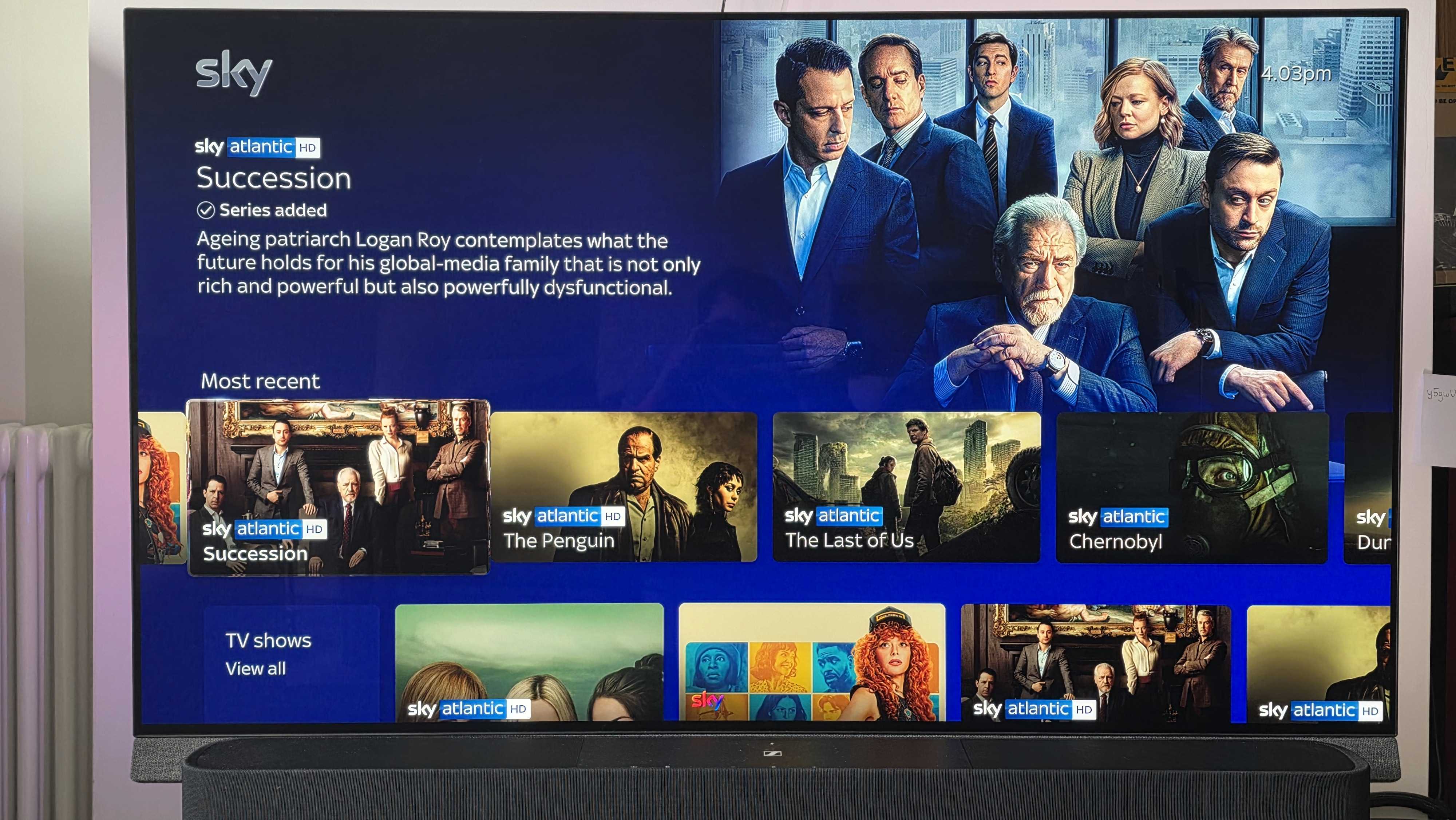 A shot of a TV with Sky content on it