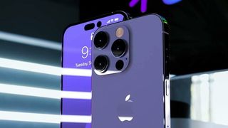 An unofficial render of the iPhone 14 Pro from the front and back, in purple