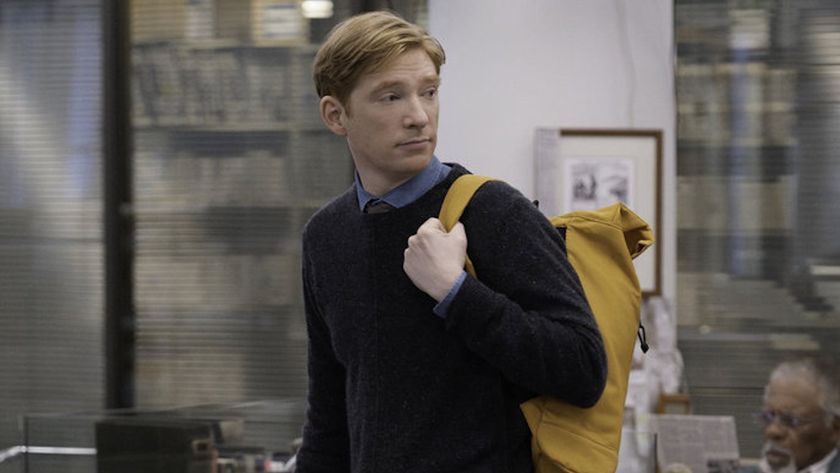 Domhnall Gleeson as Ned Sampson wearing his backpack in The Paper Season 1x01