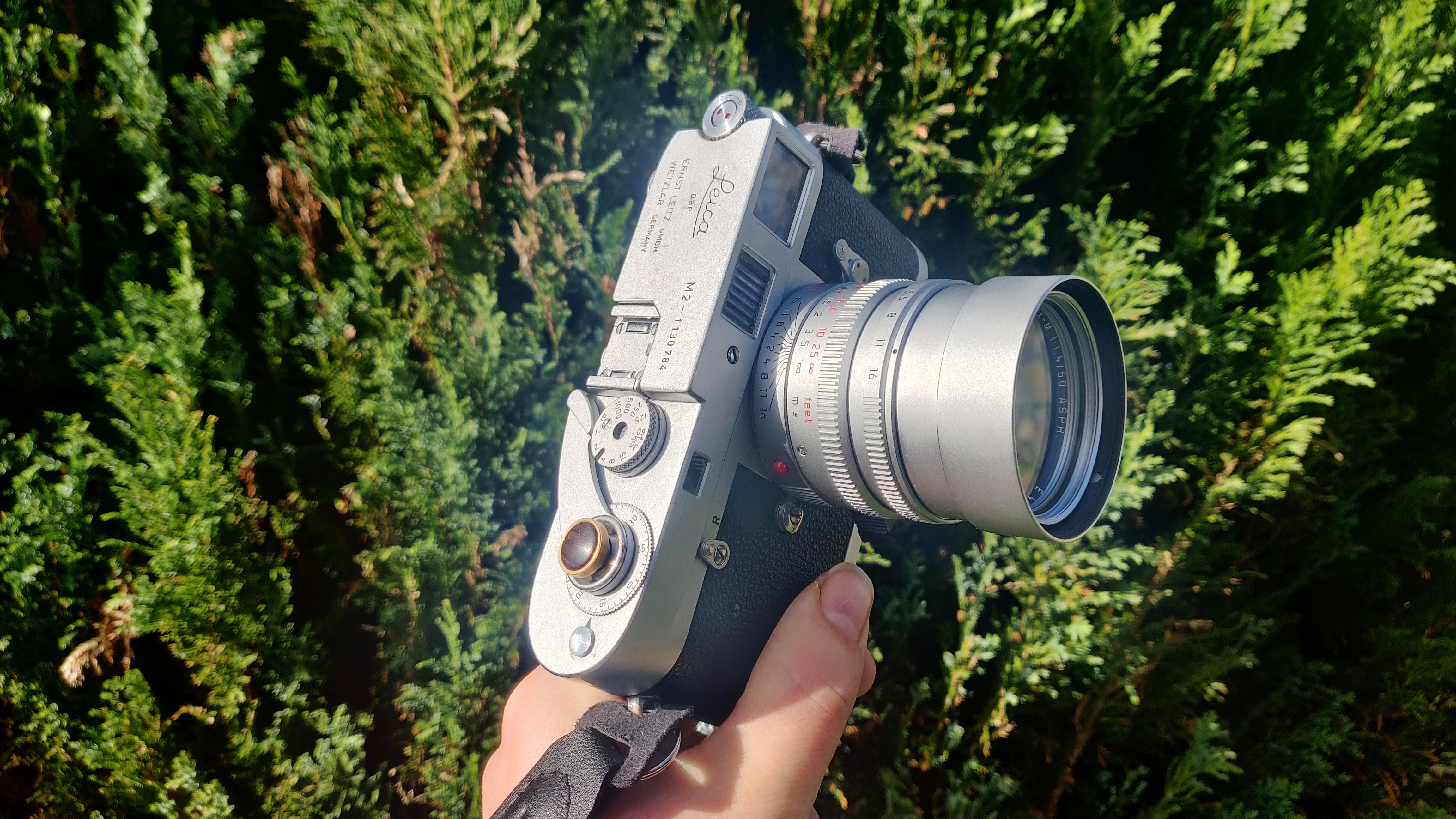 Leica M2 showing off a silver Leica 50mm Summilux attached