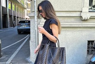 Danish fashion influencer Lida Krasniqi carrying a large Bottega Veneta Andiamo Bag.