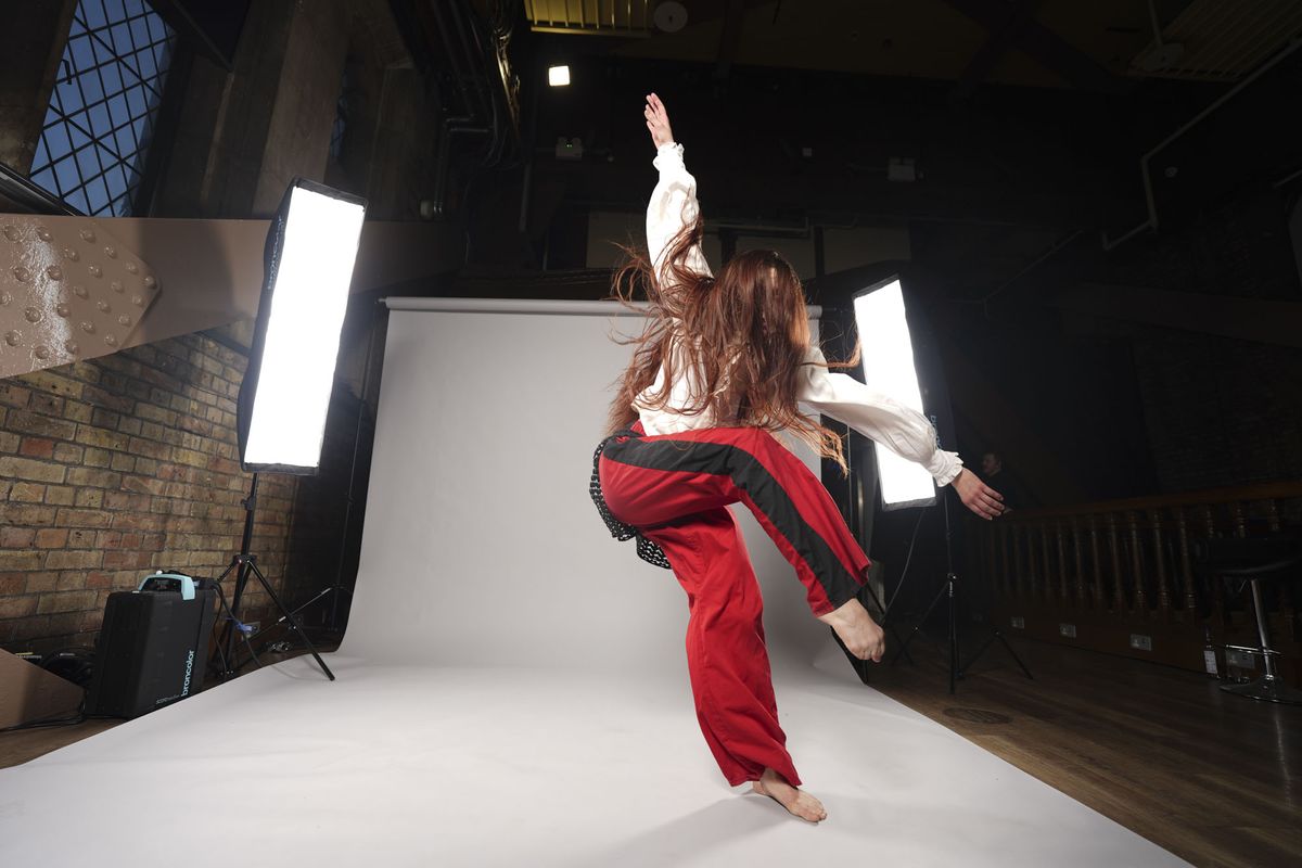 Sony A7 V sample images &ndash; dancer's movement frozen, with background roll and lights included in the frame