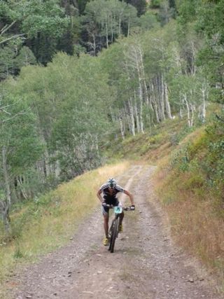 Alex Grant grinds up one of the last climbs at the Park City Point 2 Point