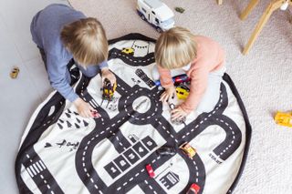 How to design a kid's room: Playmat in a playroom by Sorens House