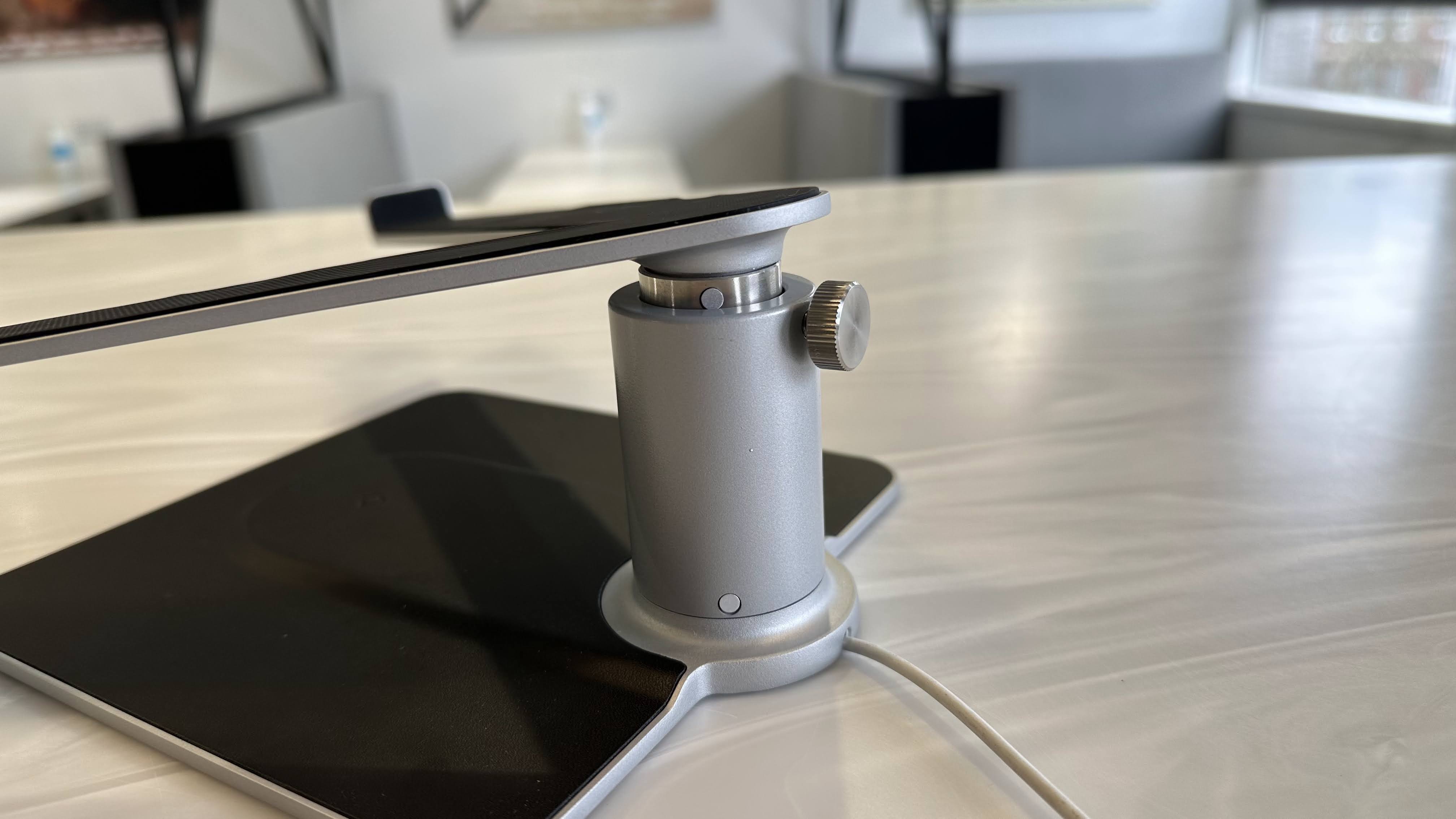 Twelve South HiRise Pro MacBook stand on a marble surface in an office