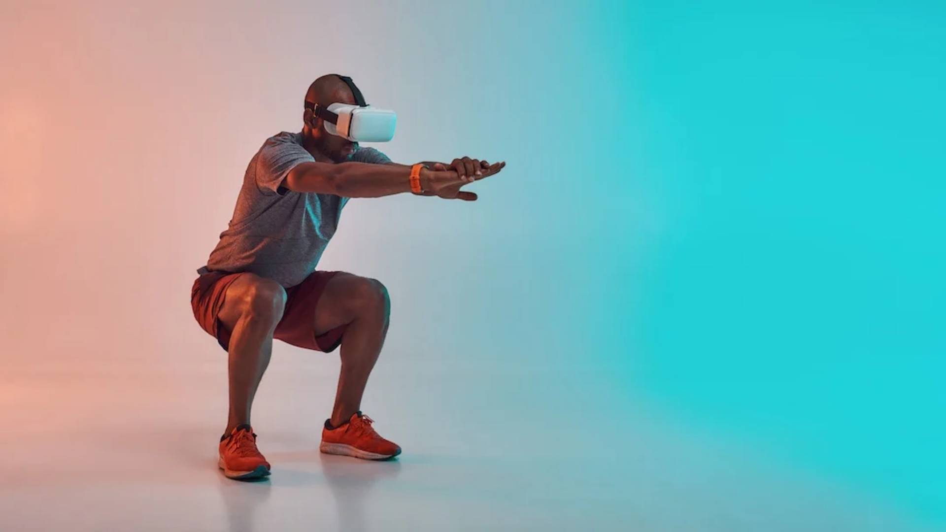 Quest 2 fitness games: a man doing a squat wearing a VR headset