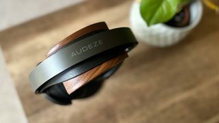 Audeze Maxwell top down to show headband on wooden stand
