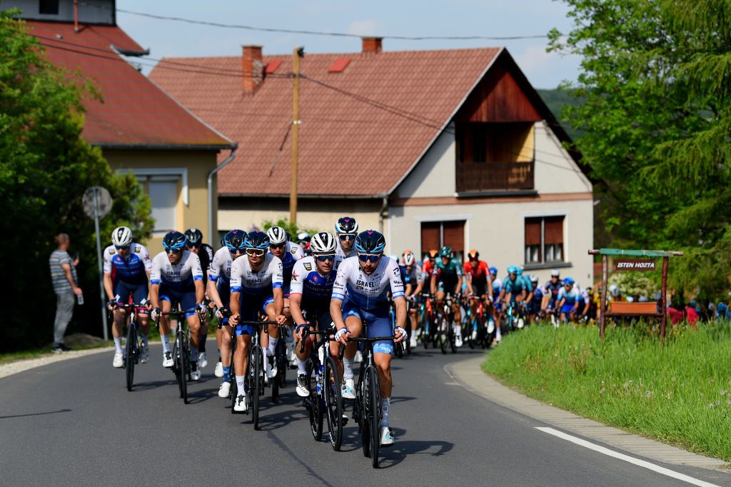 KAZINCBARCIKA HUNGARY MAY 14 LR Iljo Keisse of Belgium and Team QuickStep Alpha Vinyl and Guy Sagiv of Israel and Team Israel Premier Tech lead the peloton during the 43rd Tour de Hongrie 2022 Stage 4 a 177km stage from Kazincbarcika to Kazincbarcika tourdehongrie on May 14 2022 in Kazincbarcika Hungary Photo by Dario BelingheriGetty Images