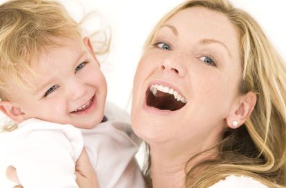 mum and child laughing photo