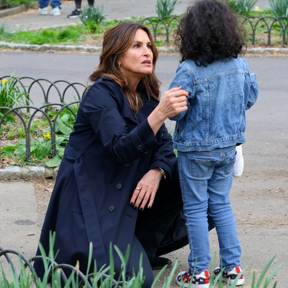 Mariska Hargitay is seen taking a break from filming 'Law and Order: SVU' help a child at the Fort Tryon Playground on April 10, 2024 in New York City