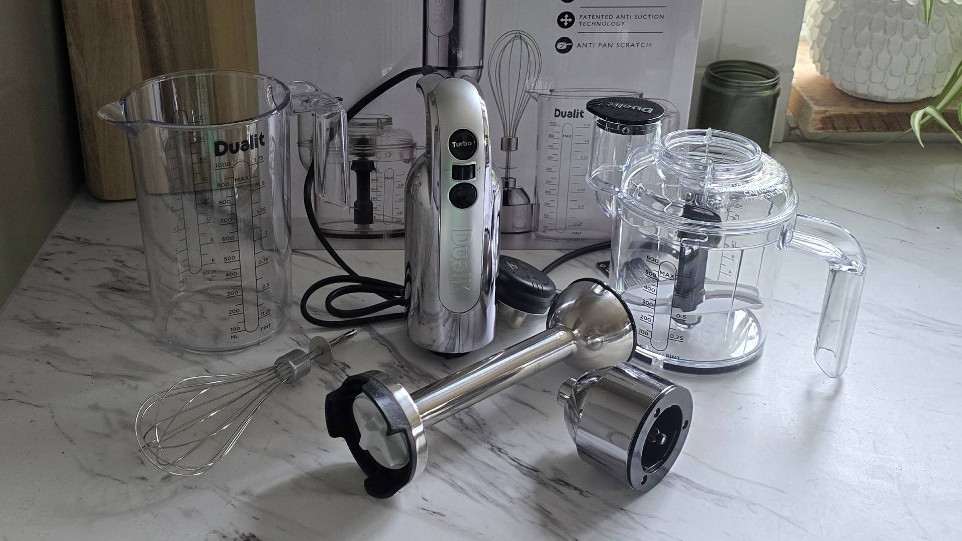 Dualit 700W hand blender attachments and body on marble effect worktop