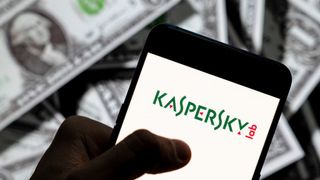 Kaspersky Lab logo seen displayed on a smartphone with USD (United States dollar) currency in the background