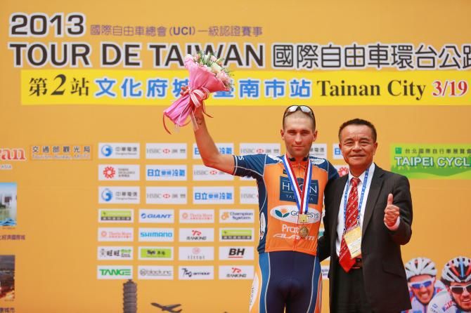 Stage winner Nathan Earle was congratulated by race organiser Lee Kai Chih