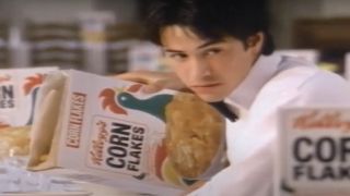 Keanu Reeves cautiously pouring cereal in Corn Flakes ad