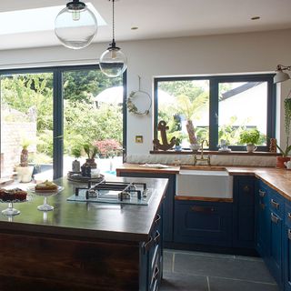 kitchen with worktop and blue drawers