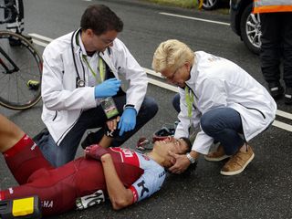 Vyacheslav Kuznetsov (Katusha-Alpecin) attended to by medics