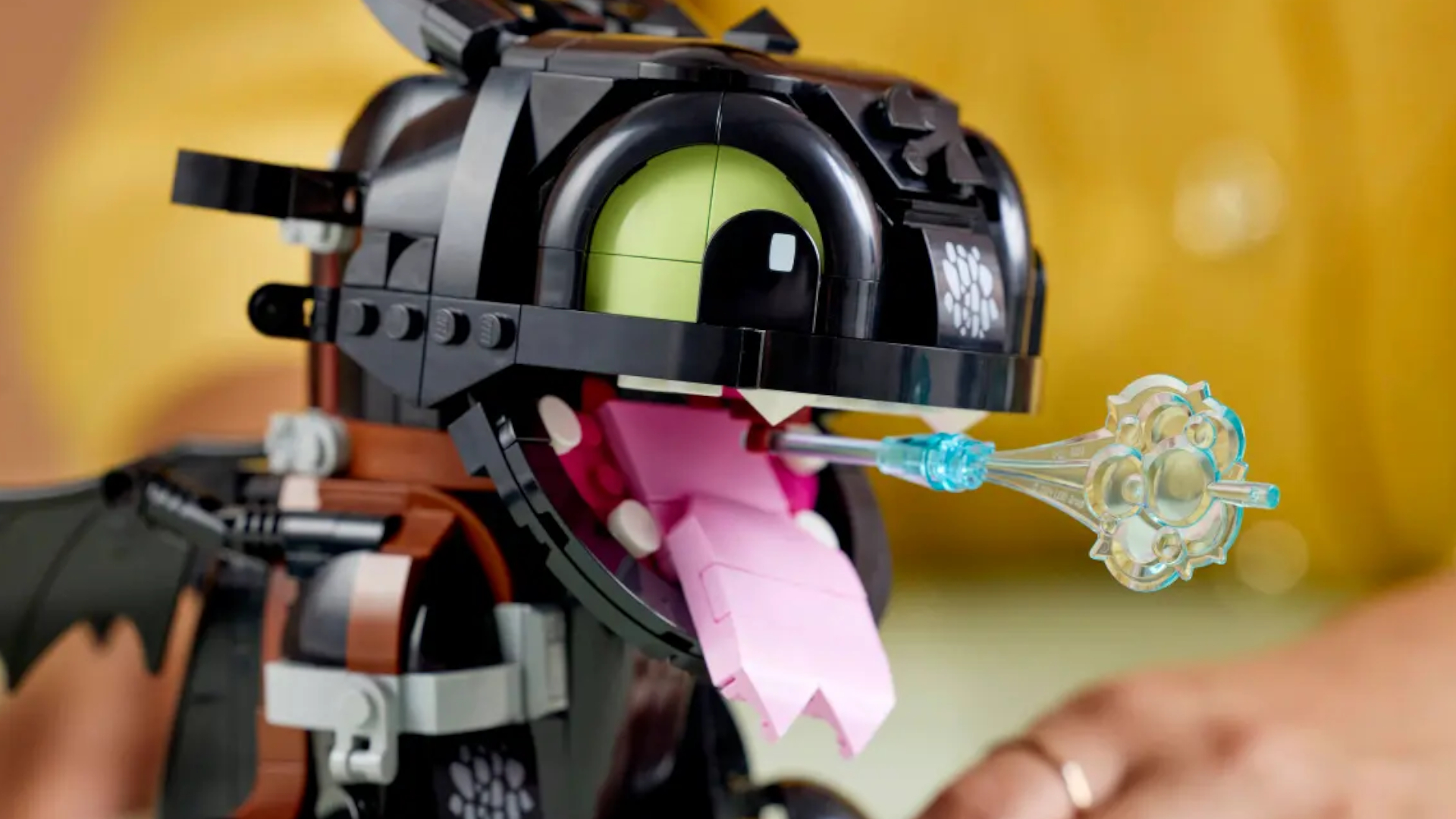 Lego Toothless model with a plasma blast in its open mouth