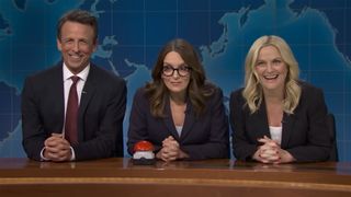 Seth Meyers, Tina Fey and Amy Poehler suit up and sit behind the Weekend Update desk in a special Season 51 guest stint.