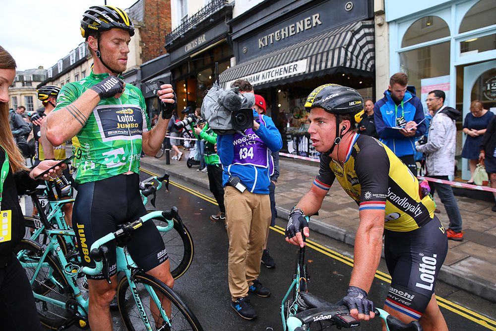 Stage 7 winner Dylan Groenewegen talks with overall leader Lars Boom