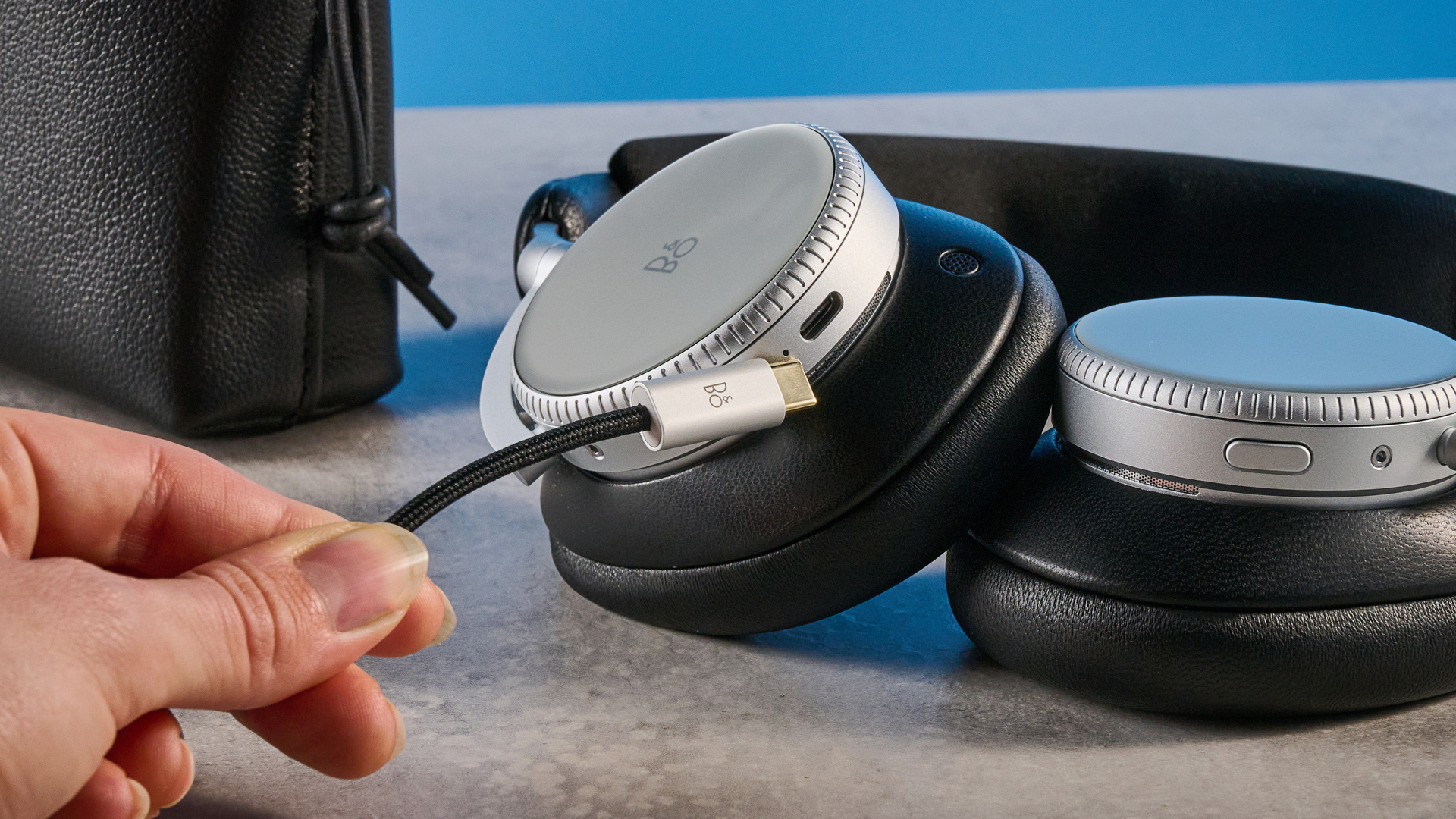 The Bang &amp;amp; Olufsen Beoplay H100 with the USB-C cable in hand