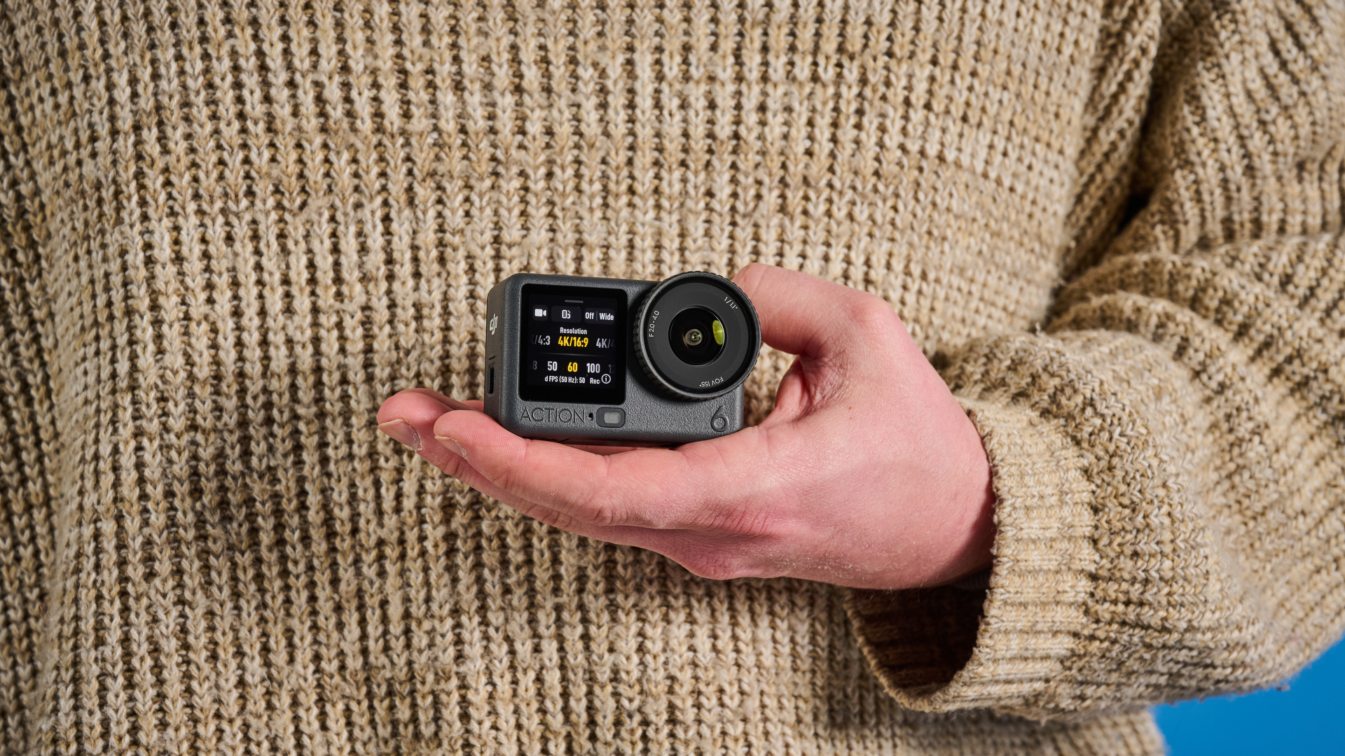 The DJI Osmo Action 6 in hand