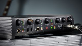 An IK Multimedia Axe I/O audio interface on a flight case