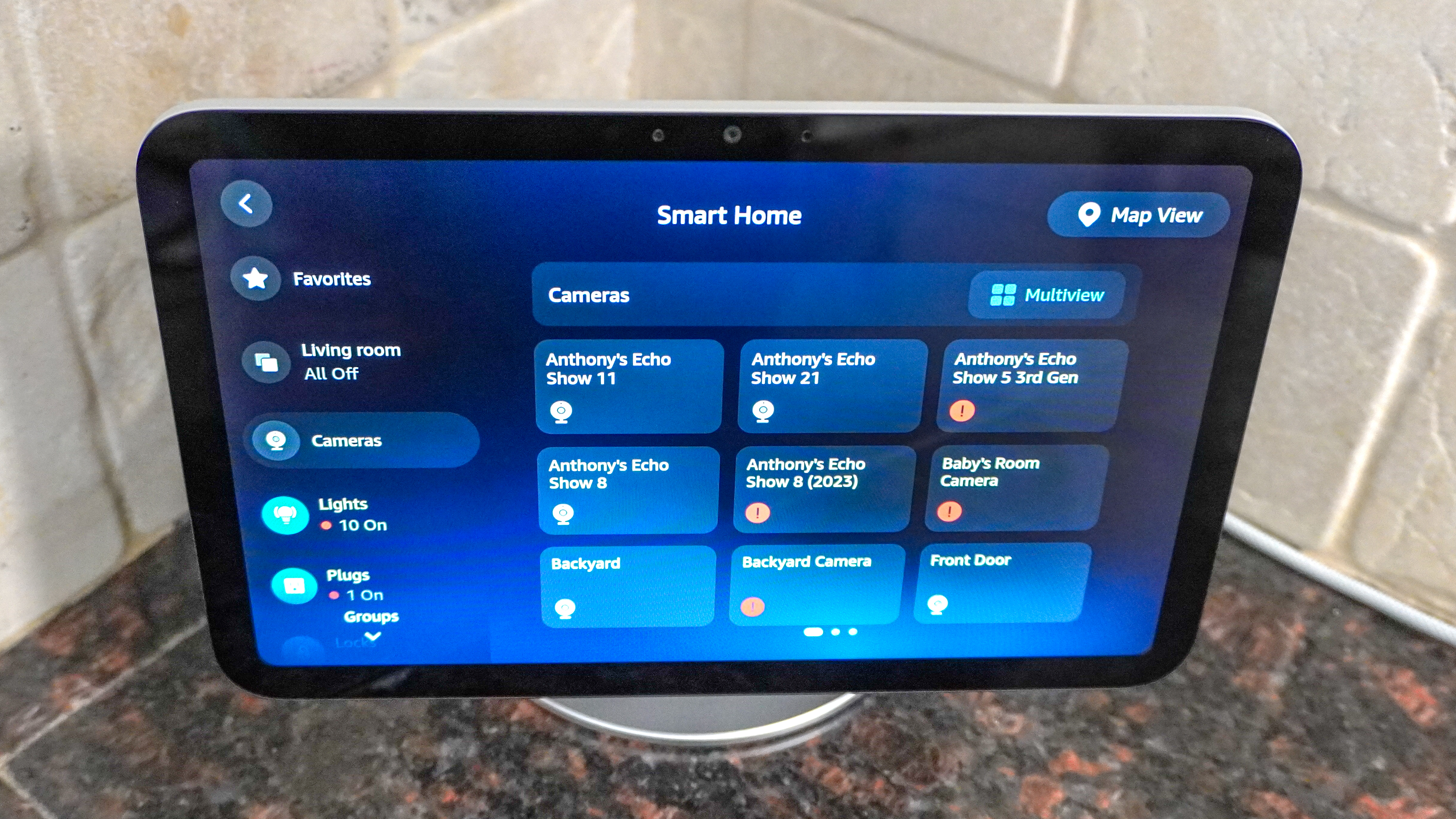 The Echo Show 8 (4th Gen) on a kitchen counter with the new smart home menu on screen