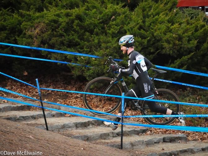 Shawn Milne (Keough Cyclocross) runs the stairs with a quarter lap remaining in the race