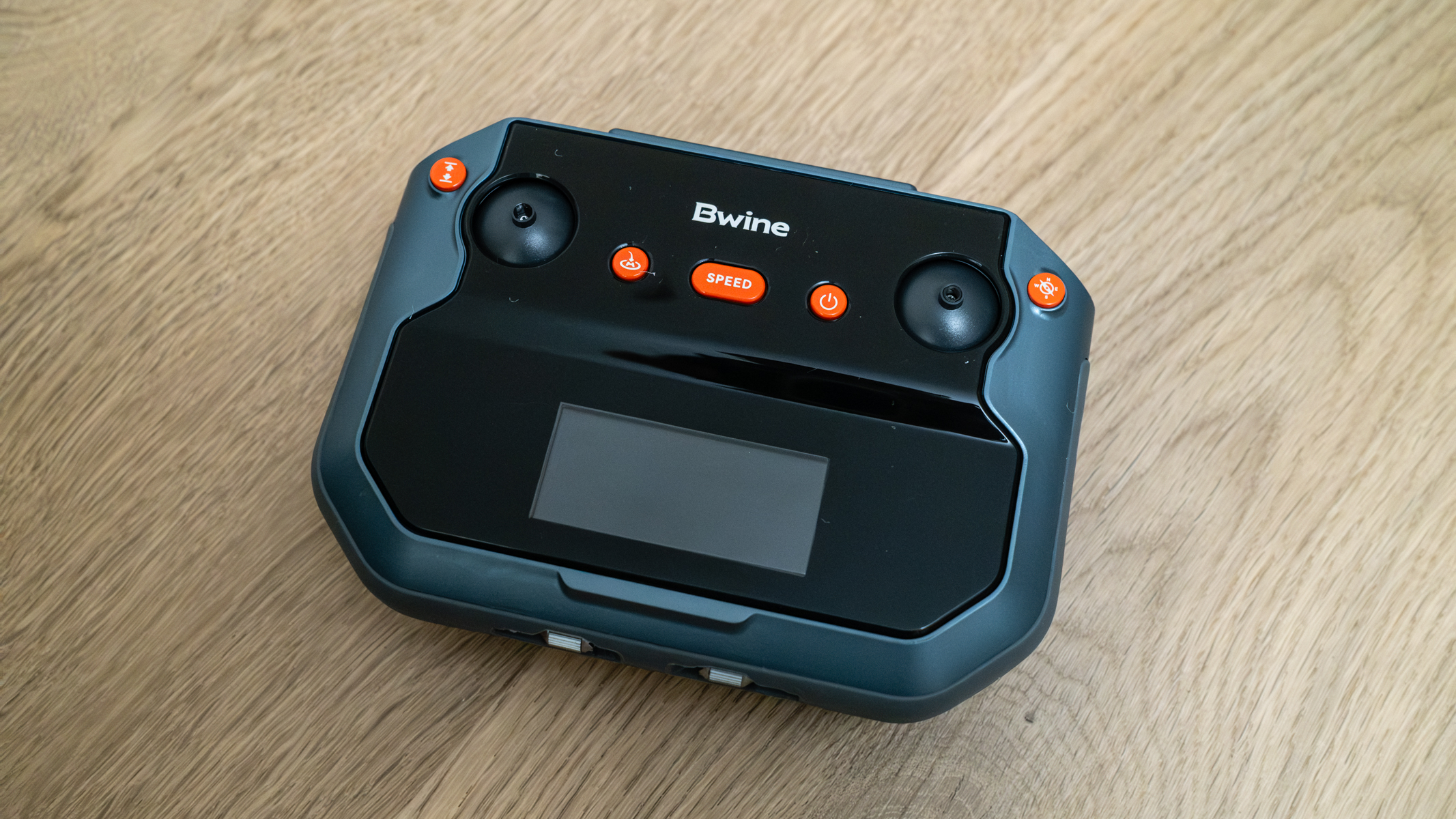 Bwine F7GIM controller on a wooden floor