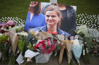 Floral tributes to Jo Cox outside Westminster