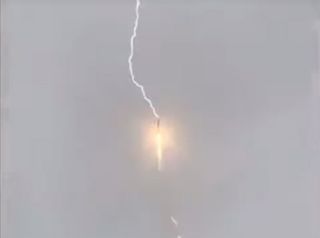 A Russian Soyuz 2.1b rocket is struck by lightning as it launches a Glonass-M navigation satellite into orbit from Plesetsk Cosmodrome on May 27, 2019.
