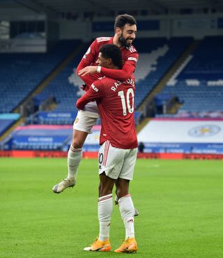 Bruno Fernandes, top, and Marcus Rashford celebrate the latter's goal at Leicester