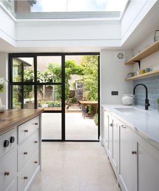 Light-filled kitchen with bi-folding doors