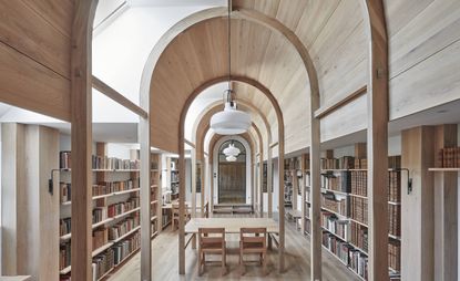 Contemporary library with dramatic arches