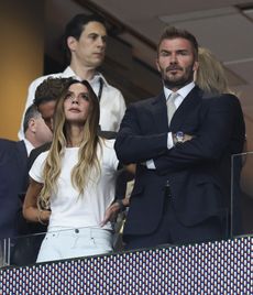 An image of Victoria Beckham wearing a white t-shirt and jeans to the 2026 World Cup semi-final England vs Argentina match.