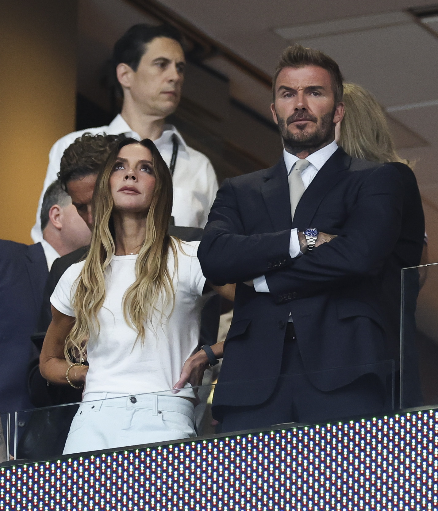 An image of Victoria Beckham wearing a white t-shirt and jeans to the 2026 World Cup semi-final England vs Argentina match.