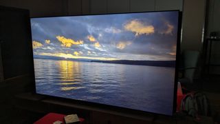 TCL 98P745 with lake on screen 