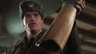 Arnold Schwarzenegger dressed as a Russian cop holding a prosthetic leg in Red Heat