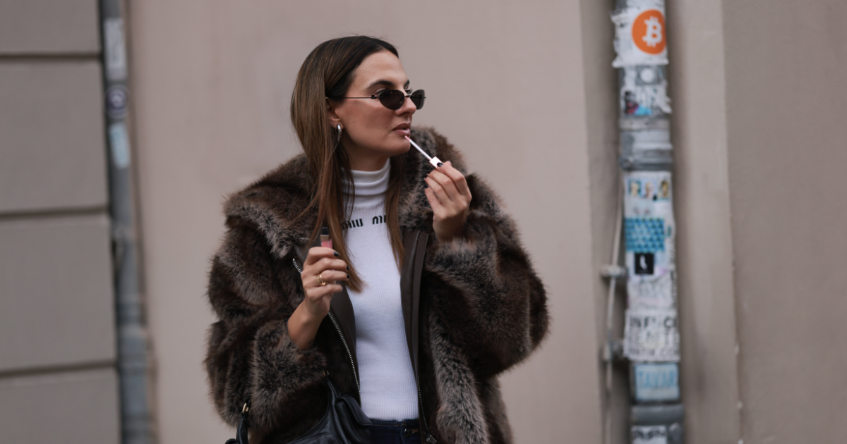 Beauty Dupes Anna Winter applying lip gloss on November 29, 2024 in Berlin, Germany. 